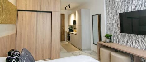 1 غرفة نوم ومكواة/لوح كي وواي فاي مجانًا وملاءات أسرّة