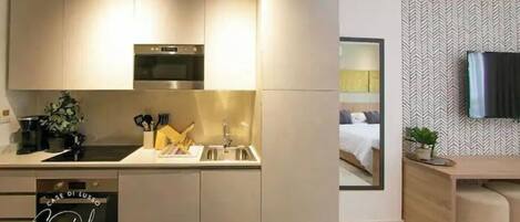 Fridge, microwave, toaster, cookware/dishes/utensils