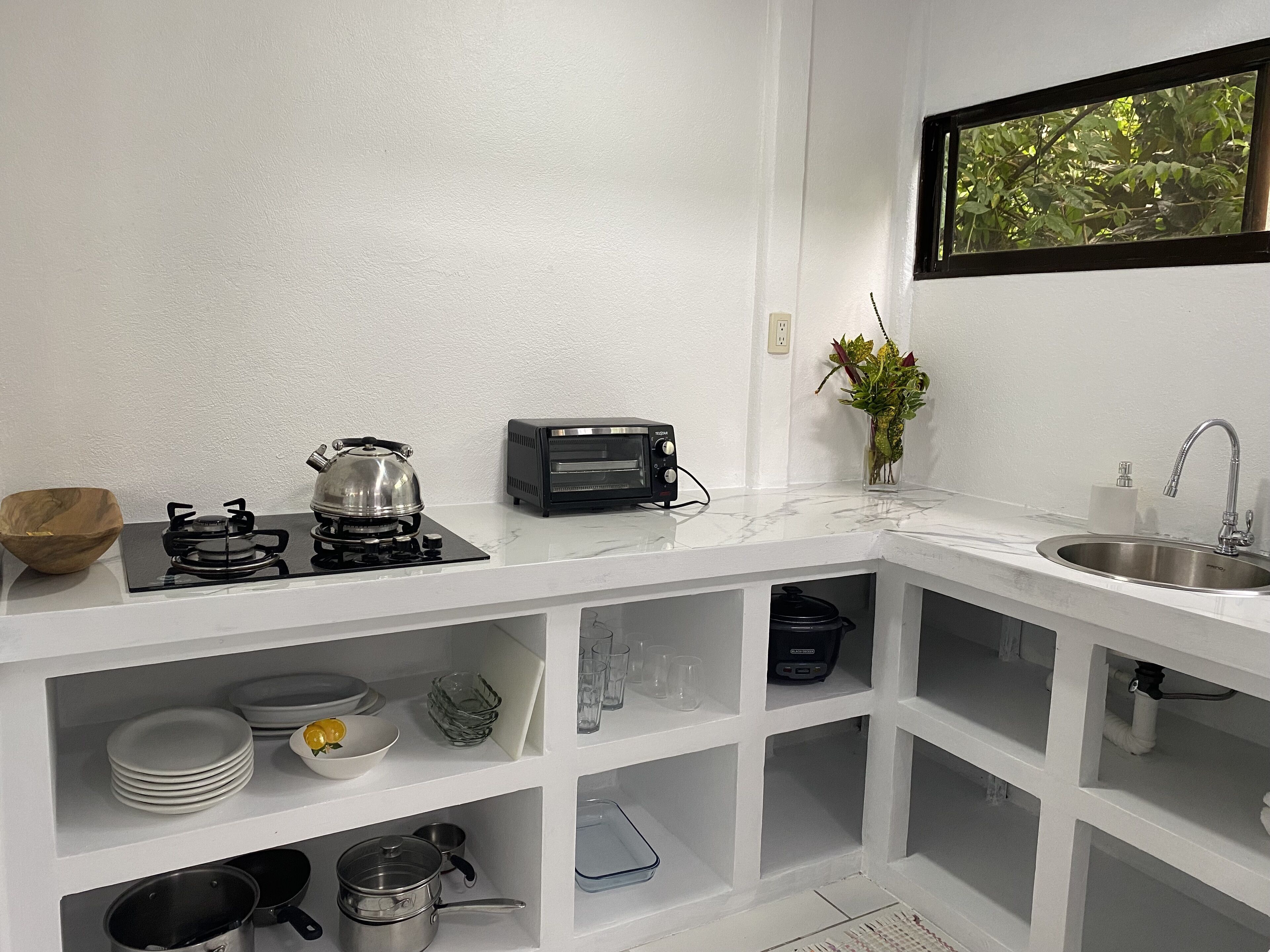 Fridge, coffee/tea maker, electric kettle, toaster