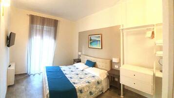 2 chambres, coffres-forts dans les chambres, fer et planche Ă repasser