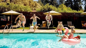 Seasonal outdoor pool, pool loungers