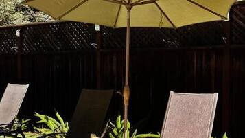 Seasonal outdoor pool, pool loungers