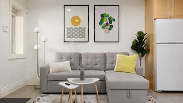 Superior Apartment | Living area | 55-inch Smart TV with digital channels, TV