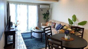 Basic Apartment, 1 Bedroom, Ocean View | Living area | Flat-screen TV - OR205 (Onna)