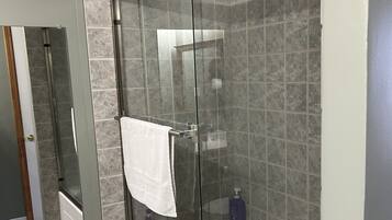 Shower, hair dryer, towels, soap