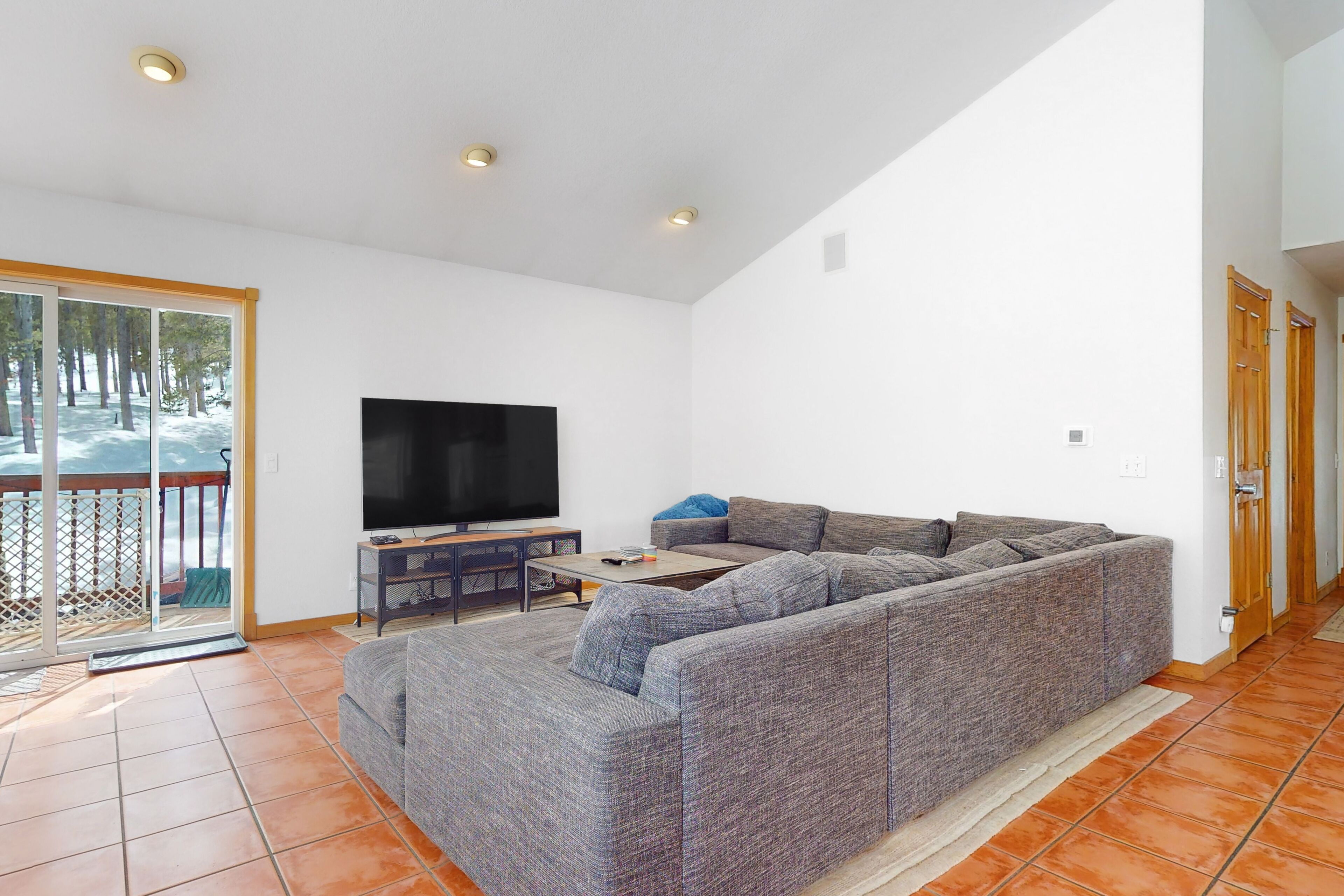 Dog-friendly home with large deck, hot tub, woodstove, W/D, & serene setting