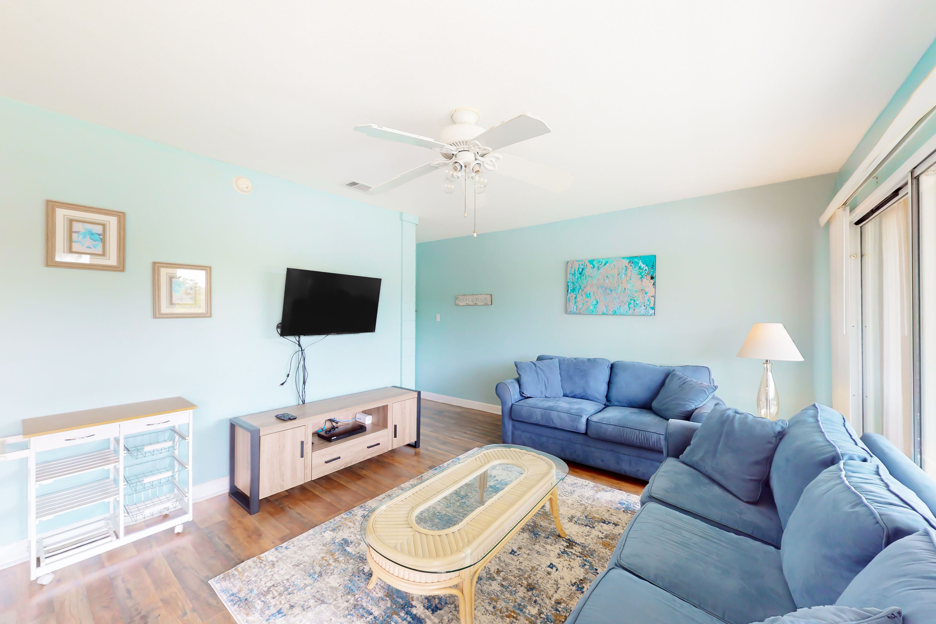 Centrally located condo with a palm-view balcony & W/D - pool and tennis access