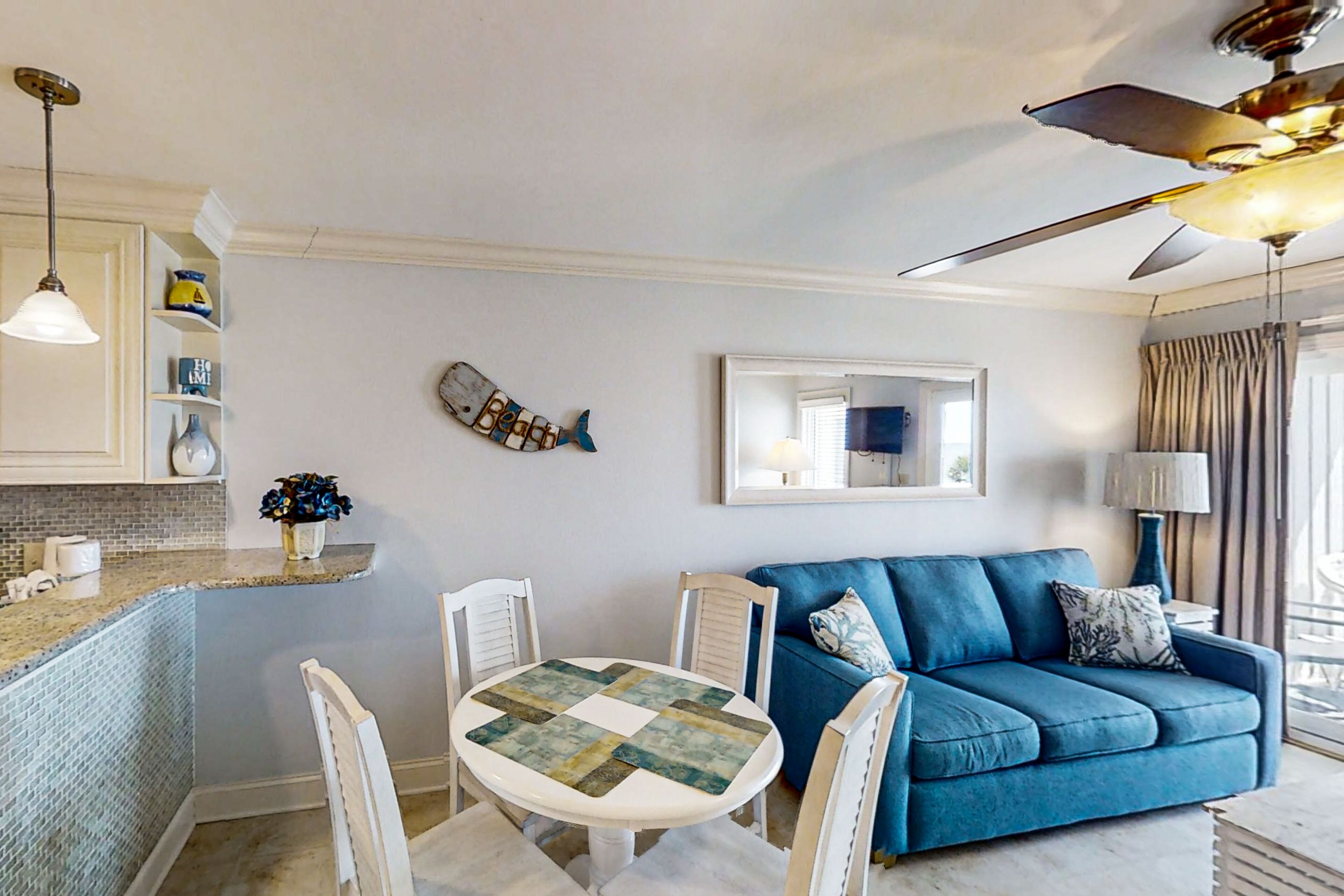 Oceanfront condo with balcony, beach view, pool access, & central AC