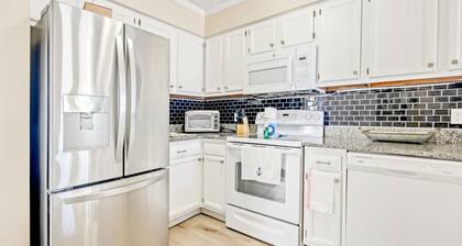 Updated condo with water views, pool, well-equipped kitchen, & deck