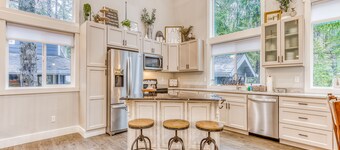 Inviting home with fireplace, sauna, full kitchen, & W/D