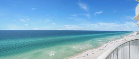 On the beach, sun loungers, beach towels