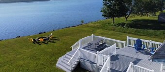 Wake up to the Sunrise in This Renovated Ocean-front Cottage!!