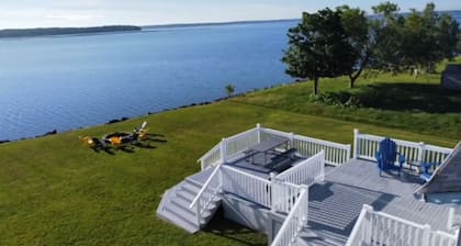 Wake up to the Sunrise in This Renovated Ocean-front Cottage!!