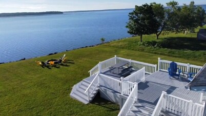 Wake up to the Sunrise in This Renovated Ocean-front Cottage!!