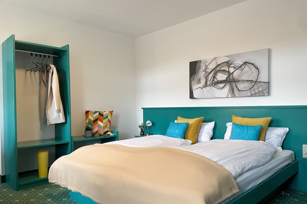 Desk, laptop workspace, free WiFi, bed sheets