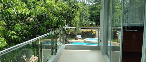 Superior Room, 1 King Bed, Balcony, Pool View | Terrace/patio