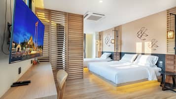 Kolmen hengen deluxe-huone | Pimennysverhot, ilmainen Wi-Fi, vuodevaatteet