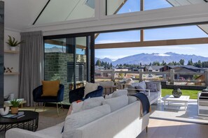 TV, fireplace, stereo - Miharo Wanaka Retreat | Spa, BBQ & Mountain Views (Wānaka)