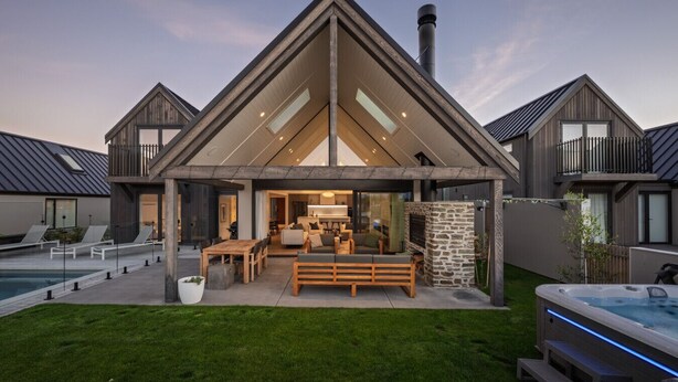 A modern house with a large patio, a hot tub, and a pool. - Marjon Peak Retreat | Spa, Pool & Mountain Views (Wānaka)
