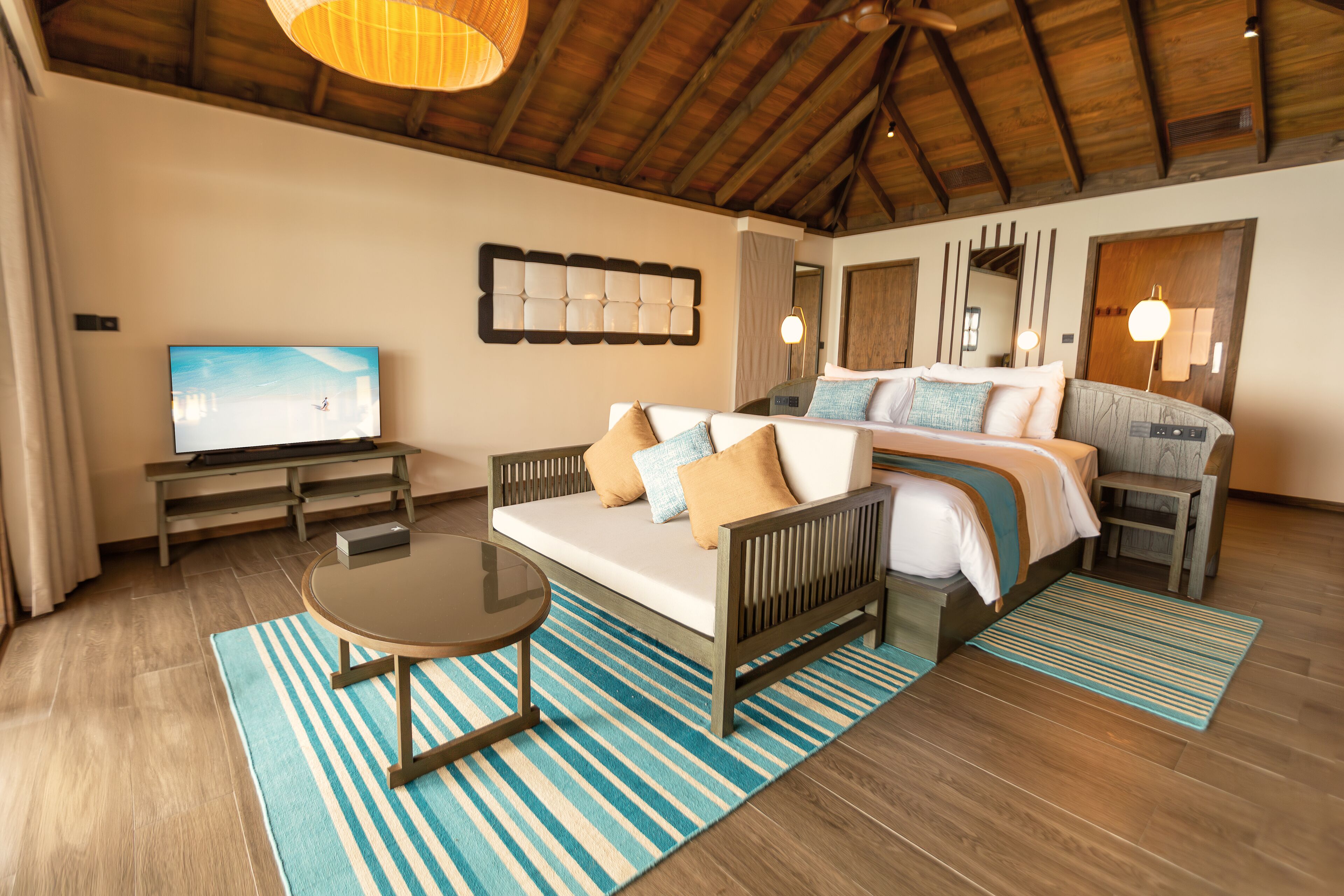 Dheru Water Pool Villa | Minibar, in-room safe, desk, iron/ironing board