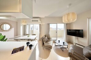 Apartment, Non Smoking, Partial Ocean View | Premium bedding, down comforters, individually decorated