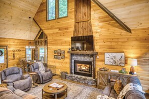 TV, fireplace, books, offices