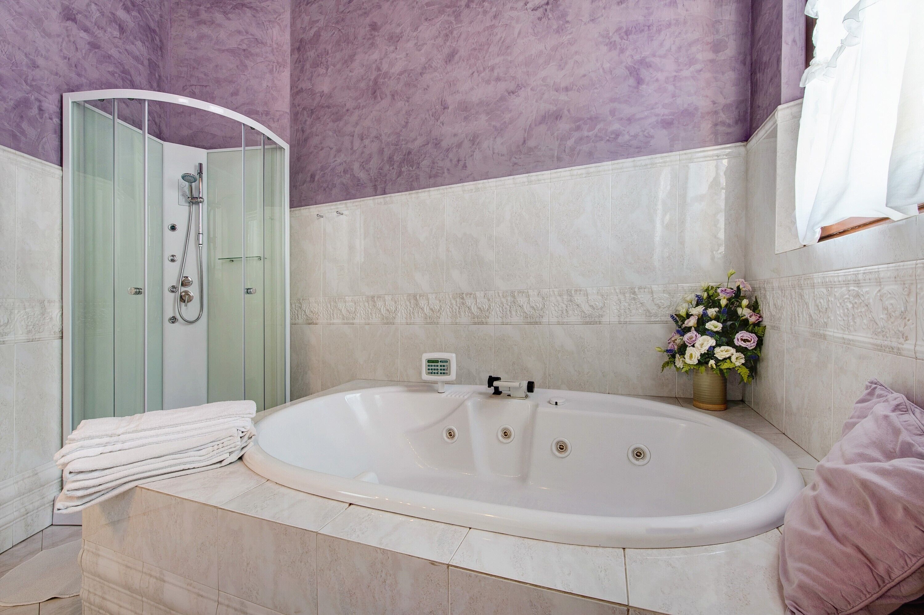 Bathtub, hair dryer, towels