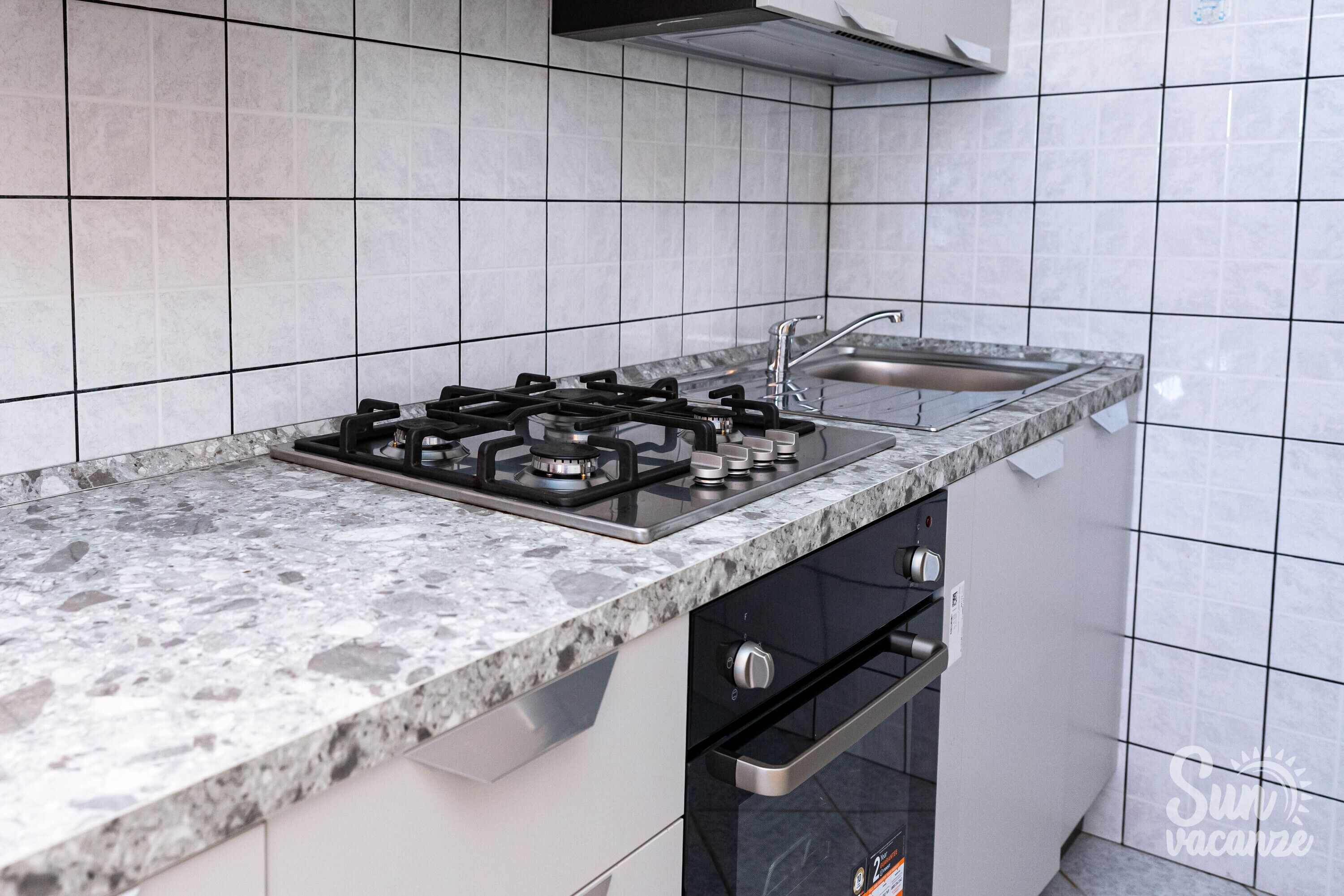 Refrigerador, horno, placa de cocina, lavavajillas