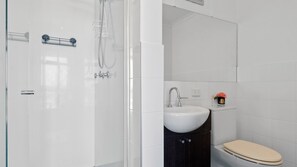 Ducha, toallas y jabón