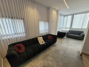 Basic Apartment | Living area | 34-inch LCD TV with cable channels, TV - YalaRent Promenade amazing 3BR apt  (Tiberias)