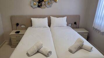 3 bedrooms, in-room safe, bed sheets