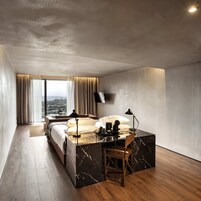 Suite with Balcony and Mountain View | Bathroom | Rainfall showerhead, hair dryer, bathrobes, bidet