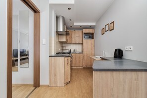 Apartment, 1 Bedroom, Kitchen | Private kitchen | Microwave, cookware/dishes/utensils - Wyszyńskiego With AC by Renters (Wroclaw)