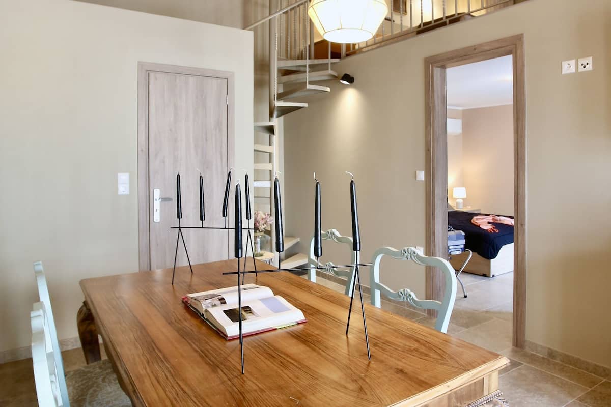 family duplex | living area | flat-screen tv