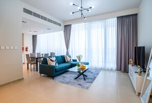 Apartamento conforto | Área de estar | Smart TV 55 polegadas com canais a cabo, TV, Netflix