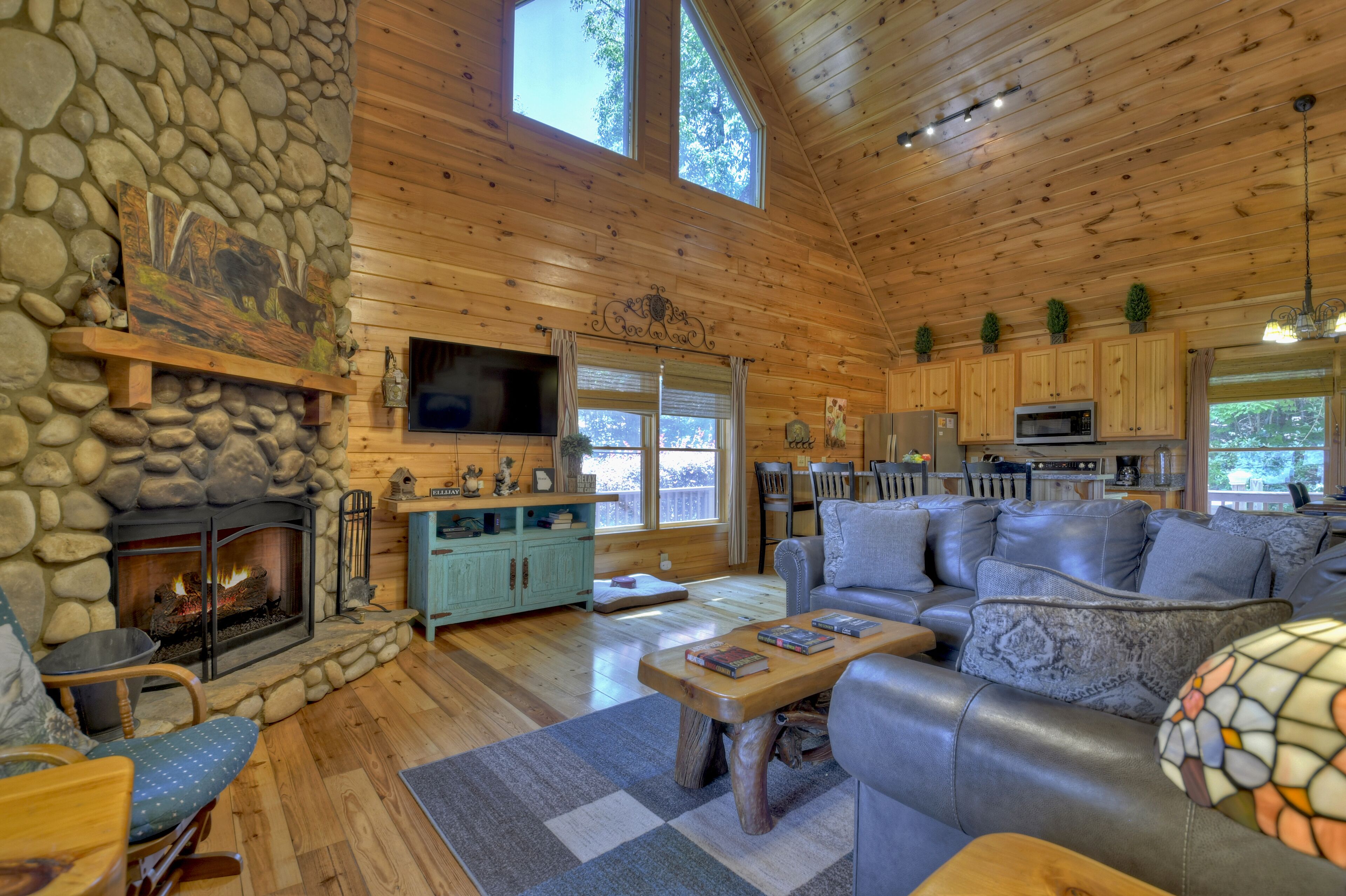 Bella Vista is a large Family Cabin with Big Mountain View, Pet Friendly, Hot Tub, Outdoor Fireplace, Ping Pong and Paved Roads. WiFi too!