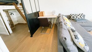 A modern bedroom with a bed, a desk, and a chair. - #FF | Pretty light in Grenoble ☀ | T2 (Grenoble)