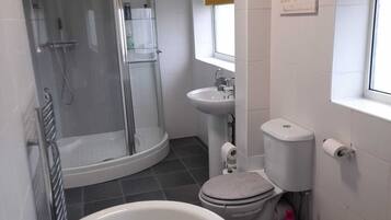 Hair dryer, towels, soap, shampoo