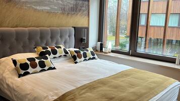 Blackout drapes, soundproofing, iron/ironing board