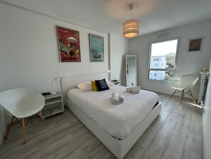 2 slaapkamers, een strijkplank/strijkijzer, gratis wifi, beddengoed