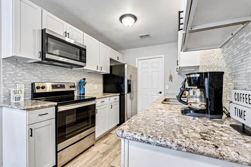 Dog-friendly townhome with private deck, charming interior, washer/dryer & AC