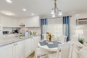 Fridge, microwave, oven, stovetop - Oceanfront retreat with a scenic balcony, W/D, and AC - beach and pool access (North Myrtle Beach)