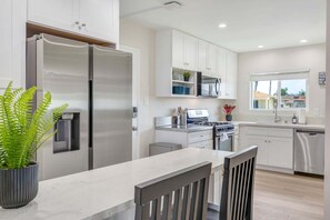 Fridge, microwave, oven, stovetop - Sunset Views & Beach Days | Tower 9 Across from the Ocean (Oceanside)