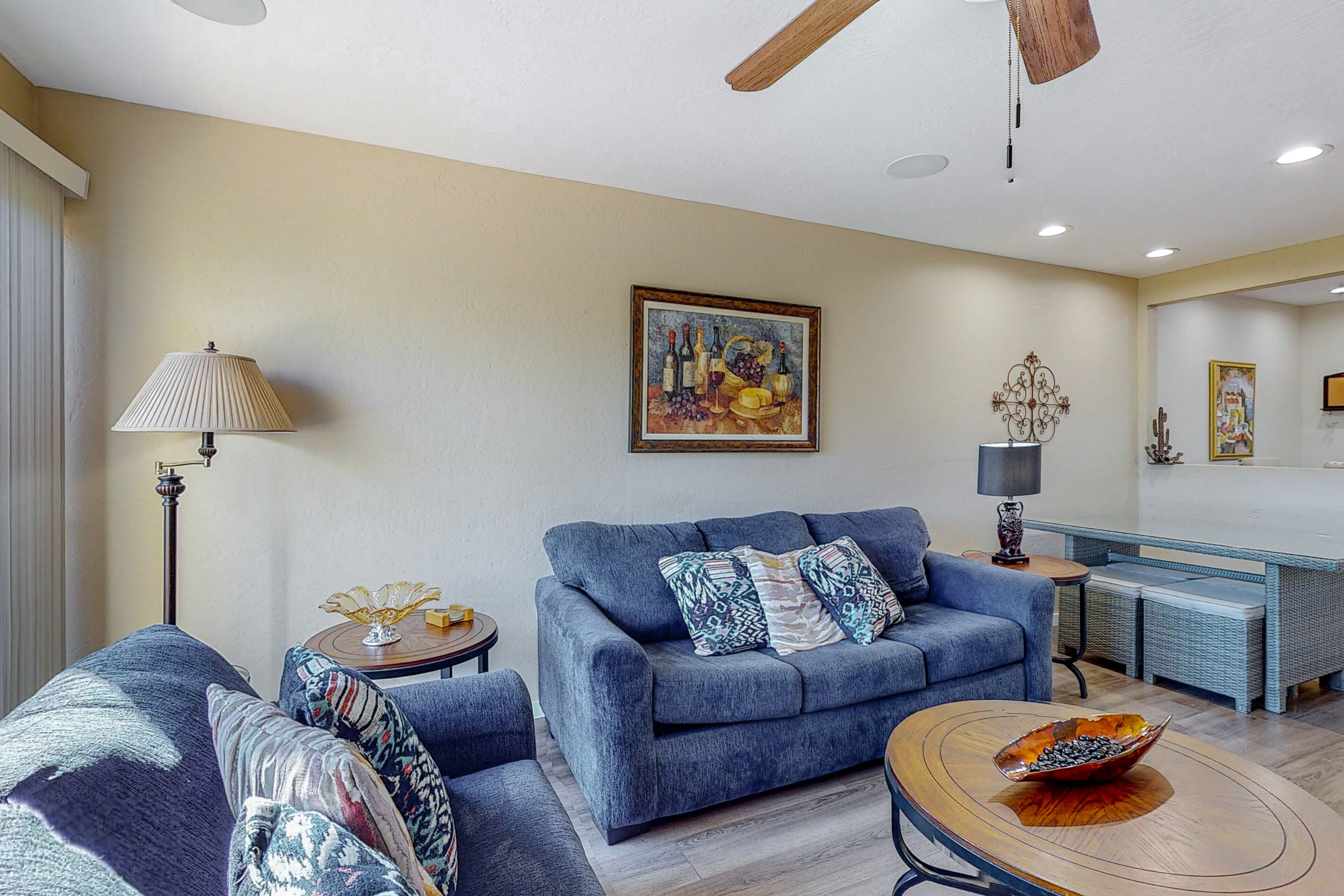 Sun-filled condo with a patio, central AC, pool & grill access - great location