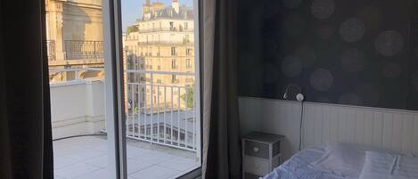 2 slaapkamers, een strijkplank/strijkijzer, gratis wifi, beddengoed