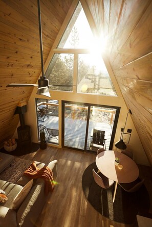 TV, fireplace - Elwood's A-frame · Modern A-frame w/ hot tub + view (Florissant)