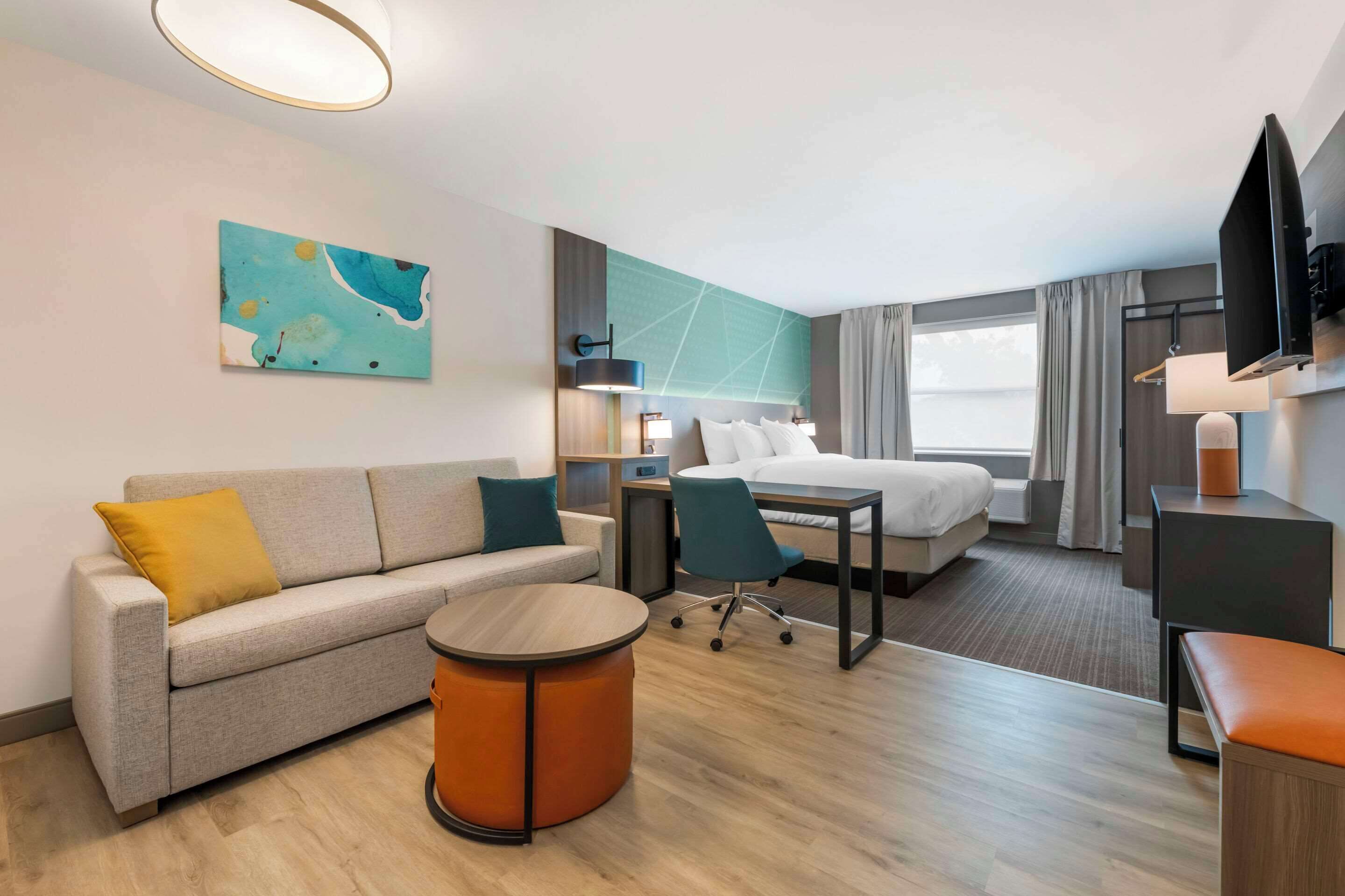 Suite, 1 King Bed with Sofa bed, Non Smoking | Premium bedding, down comforters, pillowtop beds, in-room safe