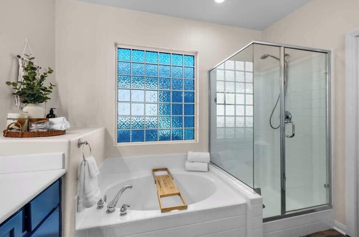 Shower, hair dryer, towels, shampoo