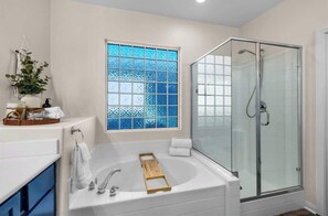 Shower, hair dryer, towels, shampoo