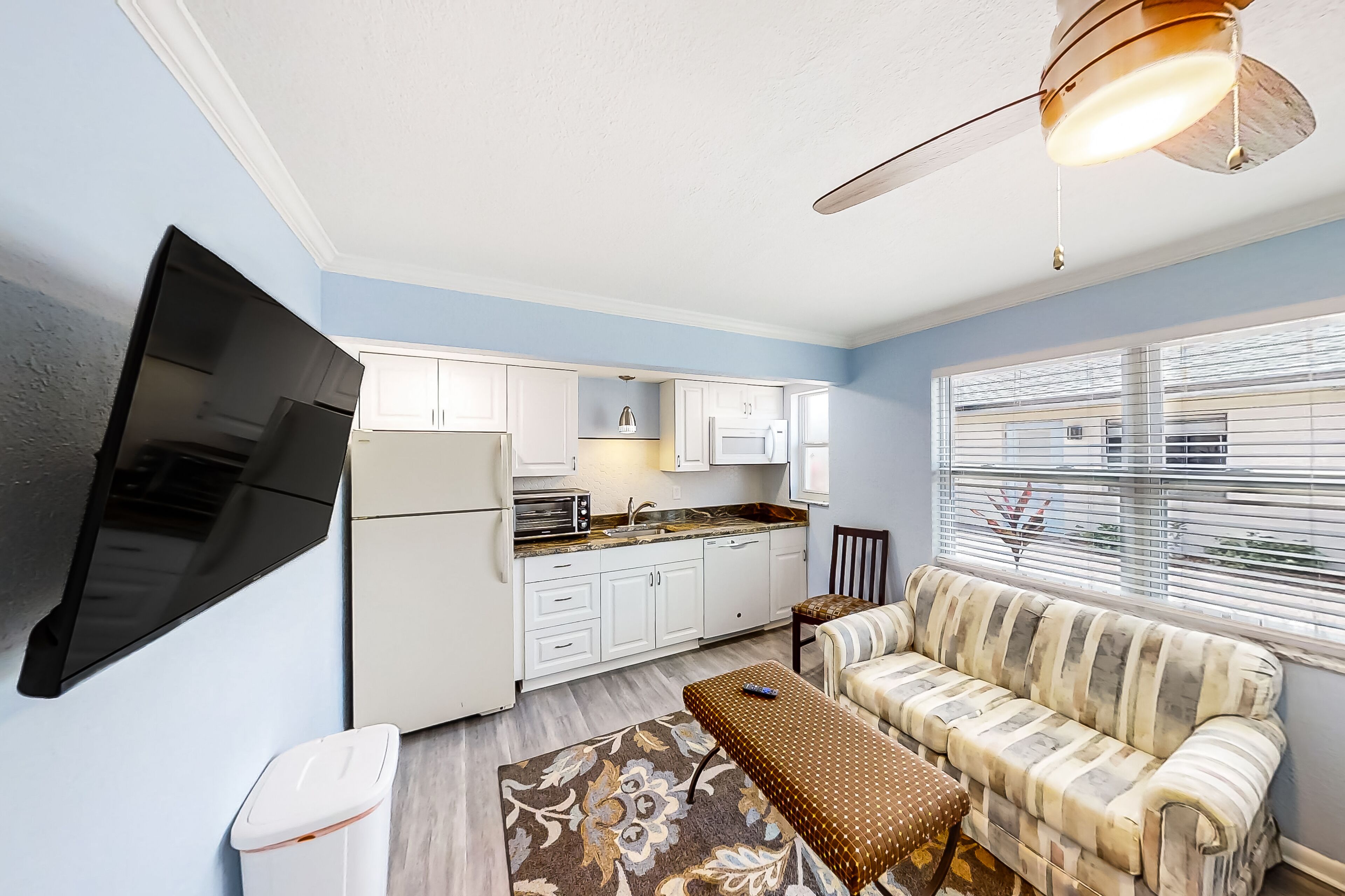 Casual condo with dock, outdoor pool, W/D, kitchenette, partial AC, streaming